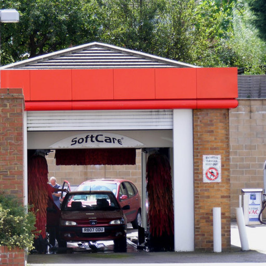 Go to a carwash instead of your garden. They have settling tanks that allow the treatment of hydrocarbons, oils and other solvents whereas your garden doesn't. © Wikimedia Commons David Sands